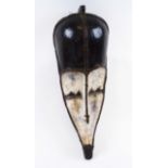 FANG FACE MASK, Gabon carved and whitened wood, approx 69cm H x 24cm max.
