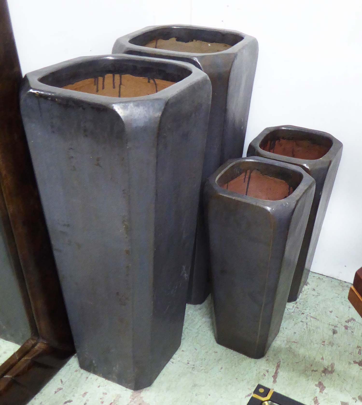 PLANTERS, two pairs, contemporary design 'Tall Boys', grey/black glaze, largest 42cm x 90cm H.