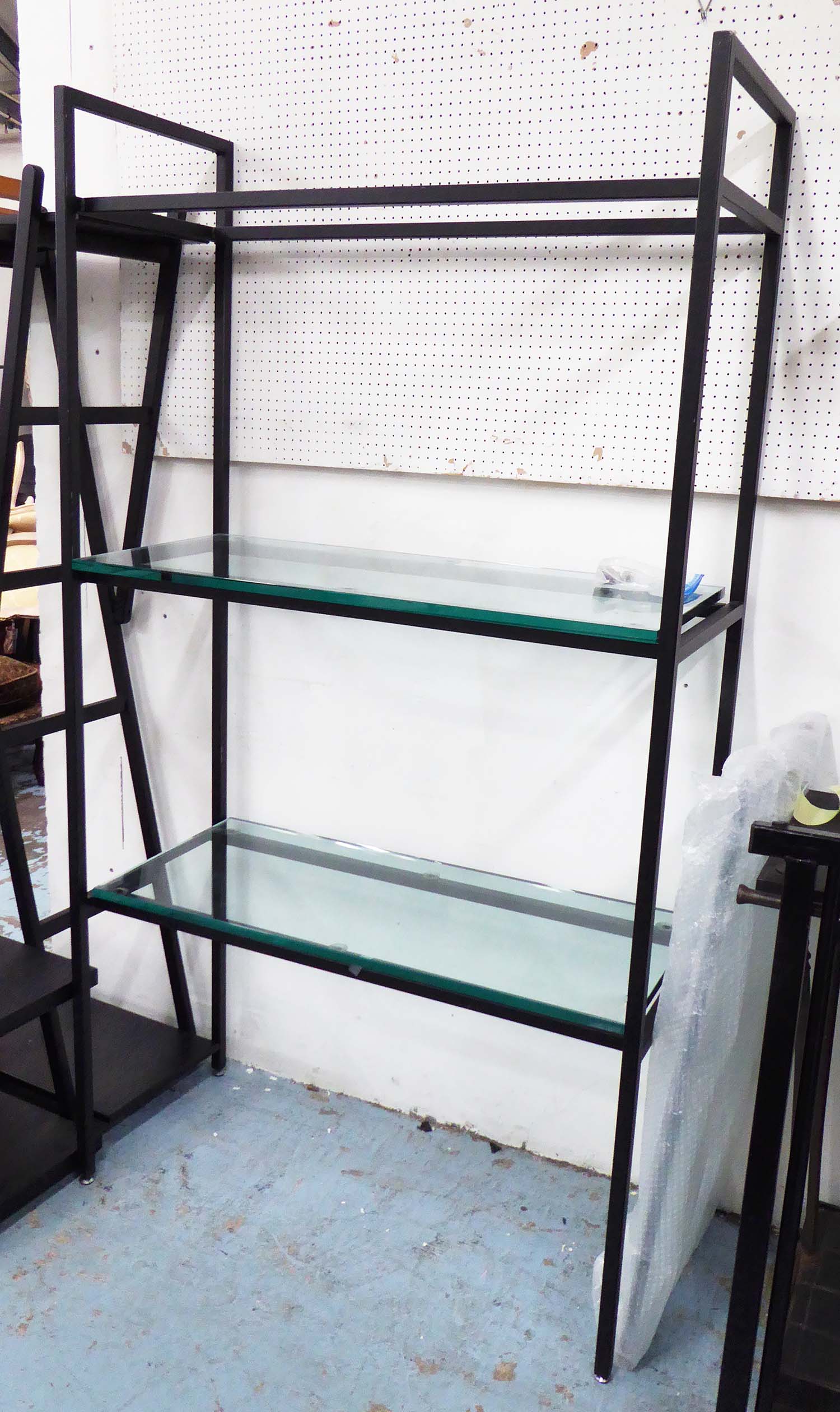 DISPLAY SHELVES, in a black metal frame, with three glass shelves, 110cm x 48cm x 202cm H.