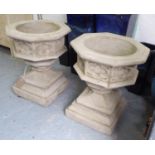 FONTS / PLANTERS, a pair in reconstituted stone, Gothic style, 87cm H.