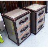 SIDE CHESTS, a pair, luggage style with three drawers below in metal cladding, 41cm x 33cm x 62cm H.