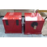 CHINESE RED LACQUER SIDE CHESTS, a pair, with rising lids, 57cm x 57cm x 53cm H.