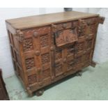 ANTIQUE INDIAN DOWRY CHEST, carved teak with hidden compartments inside on wheels,
