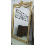 WALL MIRROR, Louis XVI style, gilt framed with swag decoration and rectangular plate,