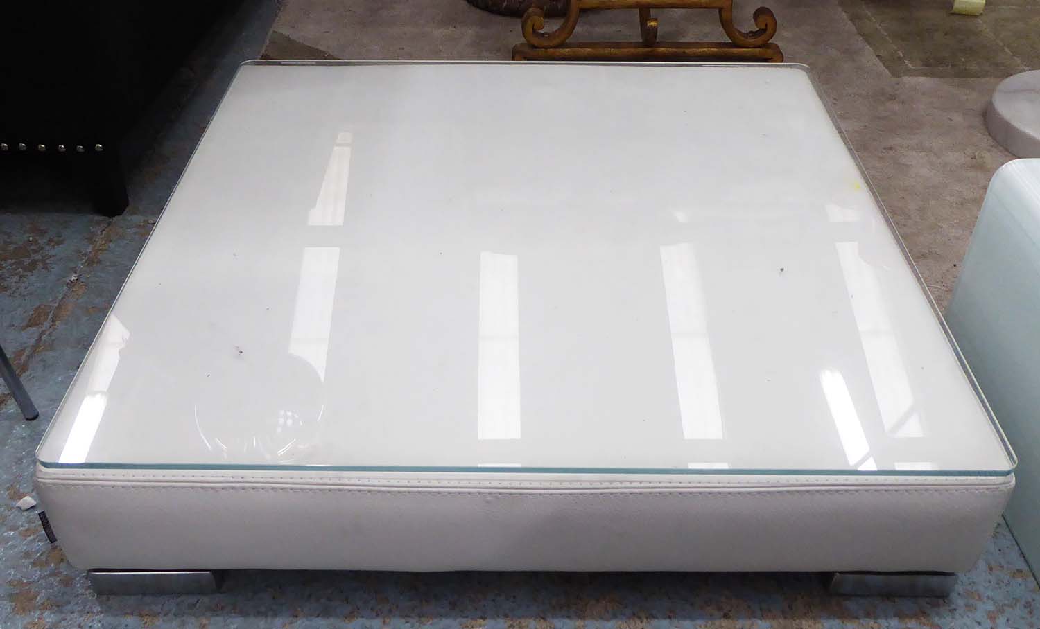 ROCHE BOBOIS LOW TABLE, white leather with glass top, 105cm x 105cm x 23cm.