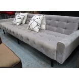 JOHNATHAN ADLER RUTLEDGE SOFA, having a buttoned back and seat, in silver upholstery on stilt legs,