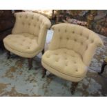 BEDROOM CHAIRS, a pair, with buttoned beige upholstery on short turned front supports with castors,