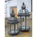 CROWN TOP CANDLE LANTERNS, Georgian style, glass lined domed metal frames, graduated pair,