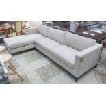 CORNER SOFA, in cream fabric with wooden plinth on square supports, 296cm x 175cm.