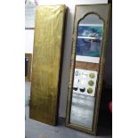 RODOLFO DUBARRY WALL MIRRORS, a set of three, repousse and etched brass with arched plates,