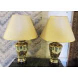 TABLE LAMPS, a pair, ceramic, each with a parchment effect shade and bird and floral decoration,