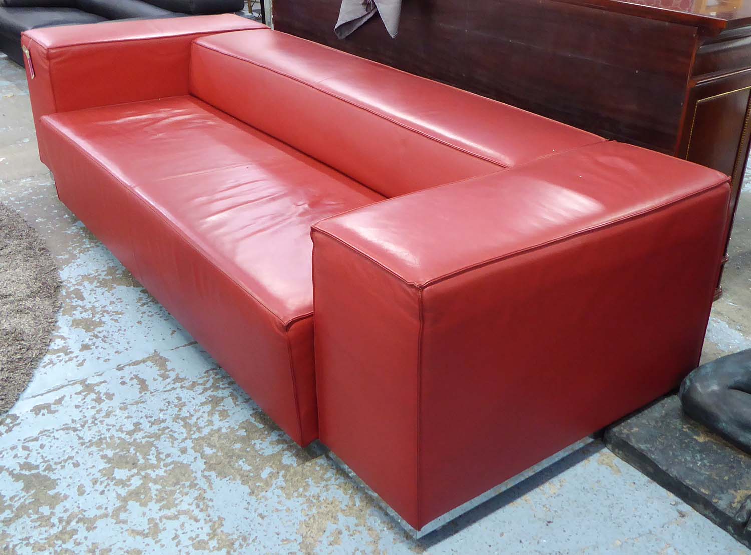 CASSINA STUDIO SOFA BED, in red leather, originally retailed for £6000, 275cm x 100cm x 65cm H.