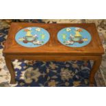 LOW TABLE, early 20th century Chinese lacquered with two circular inset cloisonné panels,