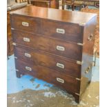 CAMPAIGN CHEST, yewwood and brass bound in two parts with five drawers and side handles,