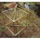 LOW TABLES, a pair, each gilt metal framed with a square glass top and concentric wave decoration,