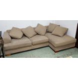 CORNER SOFA, in beige fabric, on block supports, 278cm x 163cm (with faults, a few marks to fabric).