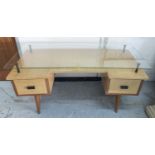 DESK, with a raised glass top and two deep drawers below on tapered supports,