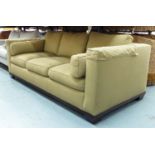 BAKER SOFA, in a green patterned fabric, 104cm D x 76cm H x 230cm L.