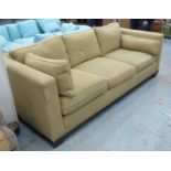 BAKER SOFA, in a green patterned fabric, 104cm D x 76cm H x 230cm L.