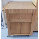 KITCHEN ISLAND, in oak block strips, with sectional drawer and cupboard below on wheels,