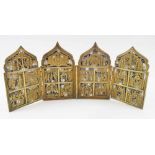 RUSSIAN FOUR FOLD TRAVELLING ICON, brass with enamel heightened figurative panels, 39.