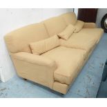 SOFA BY DE PADOVA, by Model 'Raffles', in tan, on detachable supports with castors, 96cm x 245cm,