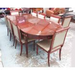 DINUCCI DINING TABLE, glass top, with floral decoration to top on turned fluted supports,