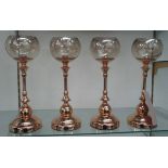 CANDLEHOLDERS, a set of four, with glass bowls, on a gold effect stem, 35cm H.