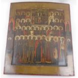 19TH CENTURY RUSSIAN ICON, depicting a multitude of saintly figures, painted on wooden penal,