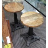 MACHINISTS STYLE STOOLS, a pair, cast steel base, 52cm.