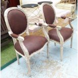 SALON CHAIRS, a pair, in faux leather oval backs on a distressed painted frame.