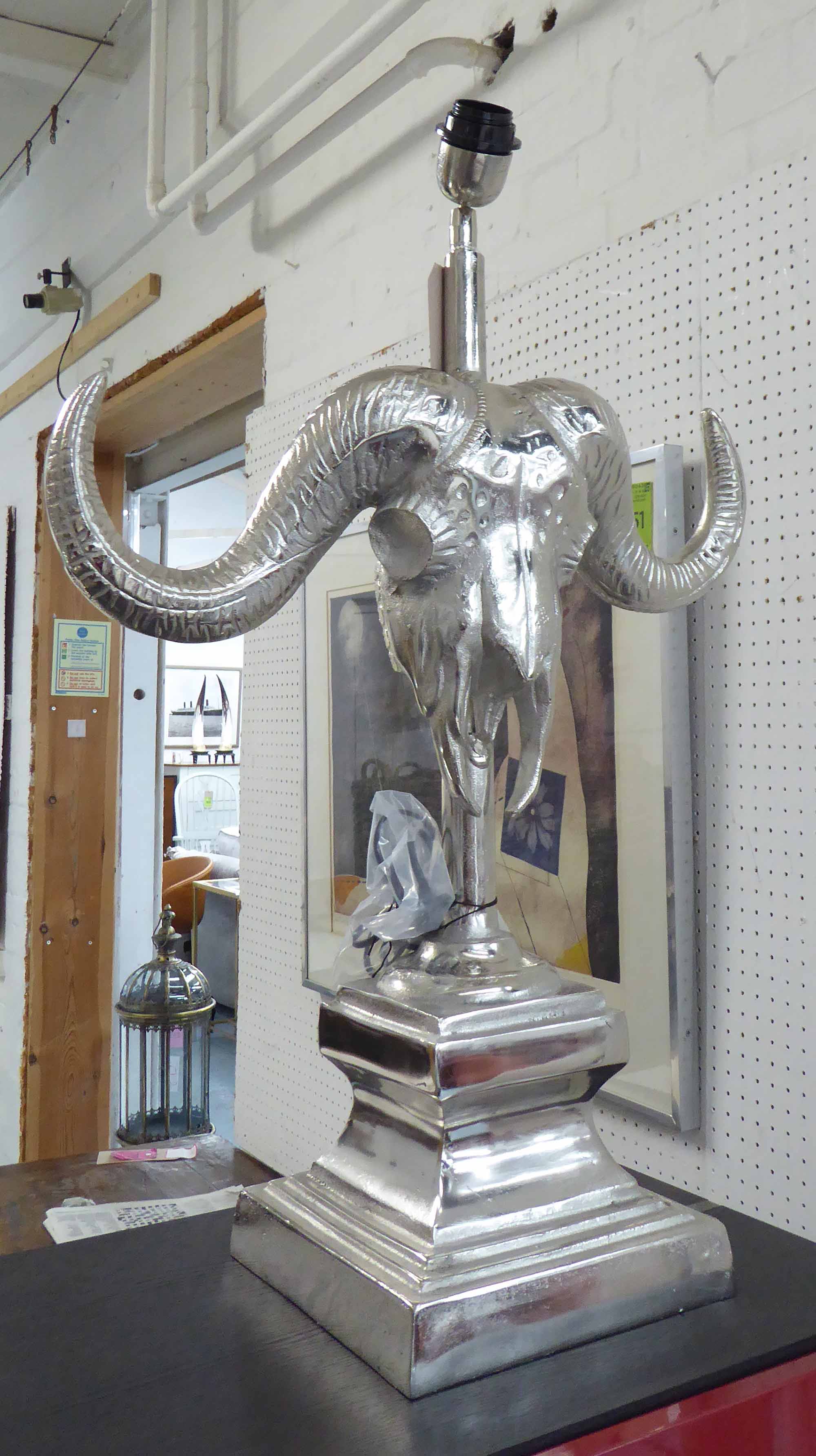 TABLE LAMP, of a buffalo skull, in plated metal, 74cm H.