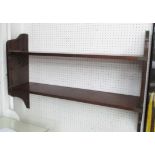 BOOKSHELF, mahogany and brass bound, 101cm W x 24cm D x 72cm H.