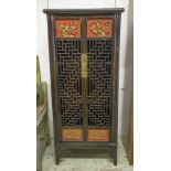 CHINESE CABINET, early 20th century, black and scarlet lacquered, with gilt and pierced decoration,