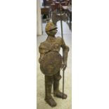 KNIGHT IN ARMOUR, rust finish metal, of small proportions, 67cm W x 140cm H.