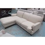 CORNER SOFA, in neutral fabric, on turned castor supports, 226cm x 168cm.