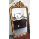 MIRROR, with a bevelled plate, Louis XV style in a gilded frame, 167cm x 91cm.