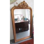 MIRROR, Louis XV style bevelled in a gilded frame, 167cm x 91cm.