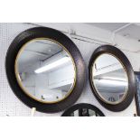 MIRRORS, a pair, circular metal Arts and Crafts style frame, 87cm diam.
