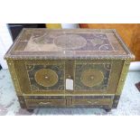 DAMASCAN CHEST, brass clad and studded with a rising lid and two drawers to base,