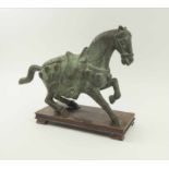 ORIENTAL EQUESTRIAN SCULPTURE, patinated metal study of warrior's horse, on wooden stand,