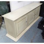 SIDEBOARD, by Decorex, having three cabinet doors enclosing shelved interior,