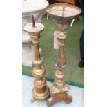 CANDLE HOLDERS, a graduated set of two, in brass finish, largest 87cm H.