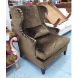 CLUB ARMCHAIR, in brown crushed velvet studded arms on square supports, 82cm W.