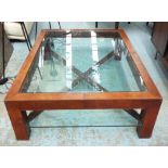 MUFTI LOW TABLE, in tanned leather with glass insert and glass undershelf, 135cm x 102cm x 40cm H.