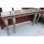 CONSOLE TABLE, Louis XV style with antique effect mirrored top on an ornately carved base,