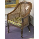 LIBRARY BERGERE, Regency mahogany in Gillows manner with carved back,