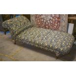 DAY BED, Victorian giltwood in a buttoned blue patterned fabric on castors, 190cm L x 72cm H.