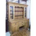 DRESSER, Edwardian pine, the rack with glazed cupboards over four drawers and two cupboards,