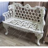 GARDEN BENCH, Victorian style cast iron of small proportions in a cream finish on swept supports,